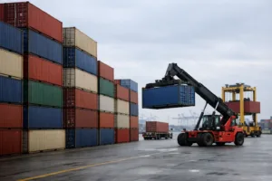 A port scene representing the movement of goods, highlighting the importance of customs and tariffs in international trade.